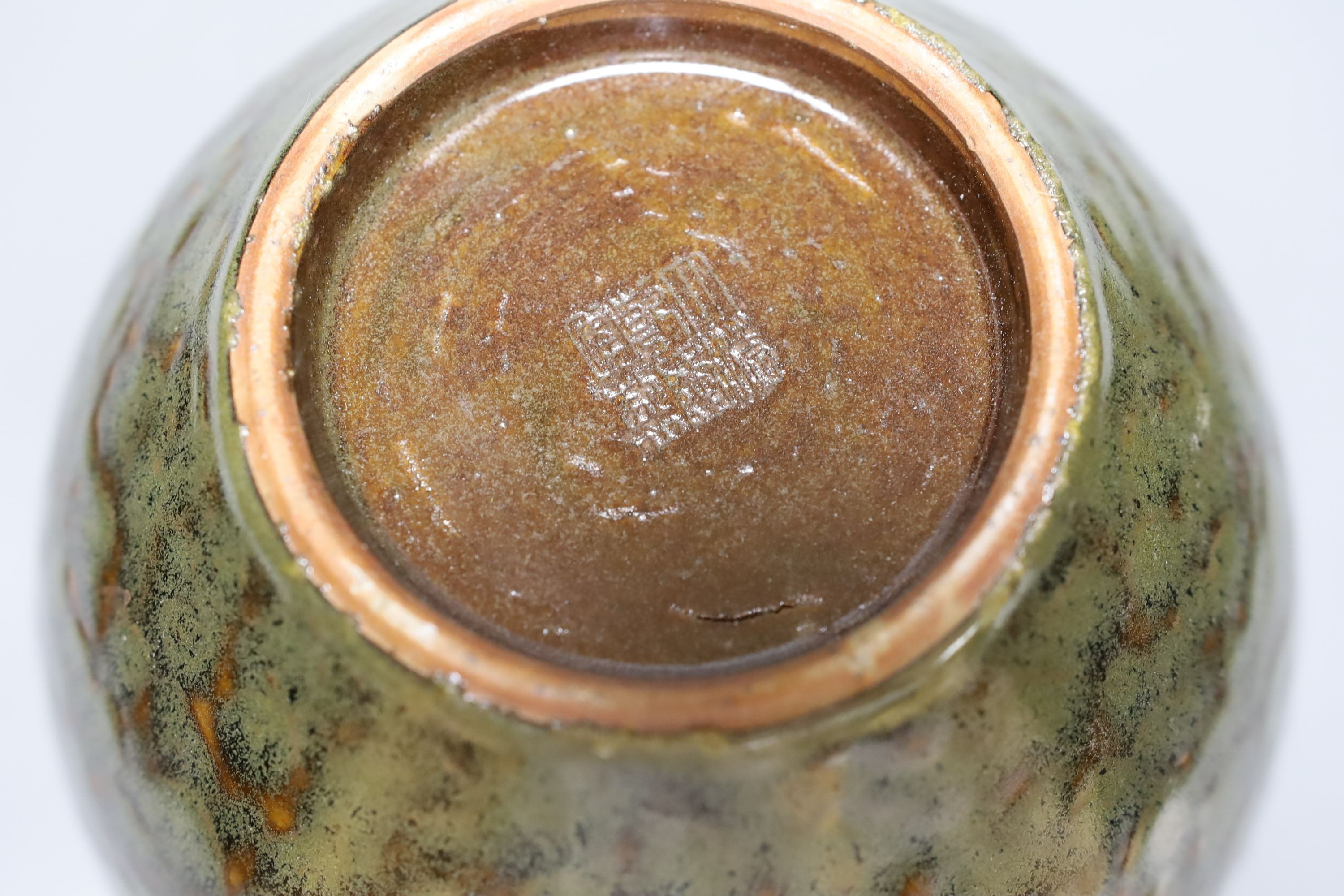 A Chinese Jian type ginger jar and a crackle glazed celadon bowl, 28cm diameter